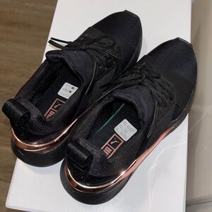 Black and rose gold Puma sneakers size 6